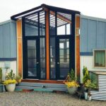 THE OHANA Combines Two 24' Tiny Homes Connected with a Sunroom Deck in Between from Viva Collectiv